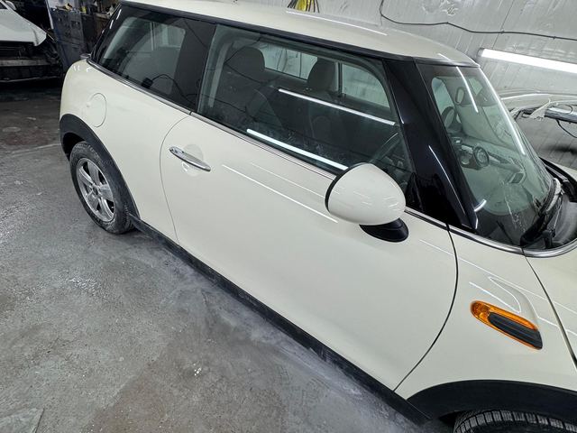 Mini Cooper — scraped door after repair at E17 Bodyworks