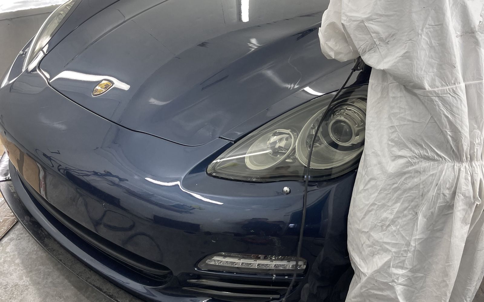 Porsche Panamera being polished after a respray at E17 Bodyworks, Walthamstow